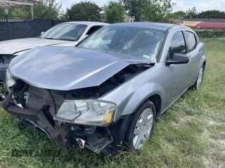 2014 Dodge Avenger SE with VIN 1C3CDZAB8EN149812, listed as a IAAI auction lot 42092082 with 126,244 mi miles and . Bid and sale history available at DreamBid. Image 2.