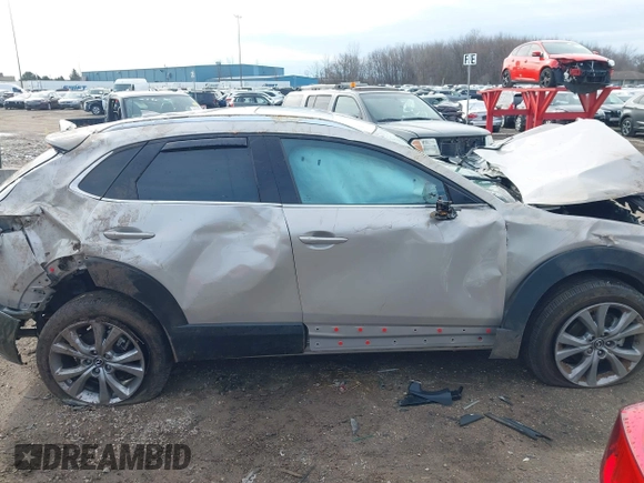 2023 Mazda CX-30 S Premium with VIN 3MVDMBDMXPM563500, listed as a IAAI auction lot 42092423 with 9,148 mi miles and . Bid and sale history available at DreamBid. Image 14.
