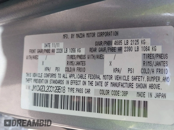 2012 Mazda Mazda5 Grand Touring with VIN JM1CW2DL2C0129518, listed as a IAAI auction lot 41872136 with 129,323 mi miles. Bid and sale history available at carsss.com. Image 9.
