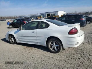 1999 Pontiac Grand Am GT with VIN 1G2NW12EXXM754842, listed as a Copart auction lot 46940335 with 124,886 mi miles and Salvage Title. Bid and sale history available at carsss.com. Image 2.