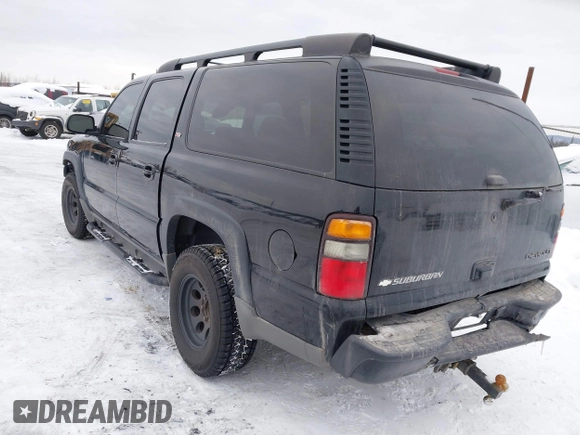 2005 Chevrolet Suburban Z71 with VIN 3GNFK16ZX5G284585, listed as a IAAI auction lot 41588062 with 212,848 mi miles. Bid and sale history available at carsss.com. Image 3.