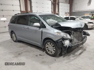 2016 Toyota Sienna XLE with VIN 5TDYK3DC7GS748075, listed as a IAAI auction lot 41795318 with 153,913 mi miles. Bid and sale history available at carsss.com. Image 1.