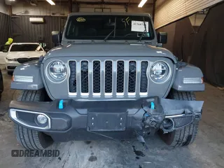 2022 Jeep Wrangler Unlimited Sahara with VIN 1C4JJXP66NW198723, listed as a IAAI auction lot 41368728 with 31,814 mi miles and . Bid and sale history available at DreamBid. Image 6.
