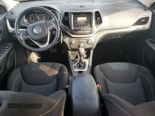 2016 Jeep Cherokee Latitude with VIN 1C4PJLCS7GW135851, listed as a Copart auction lot 64583265 with 147,191 mi miles and Salvage title. Bid and sale history available at DreamBid. Image 8.