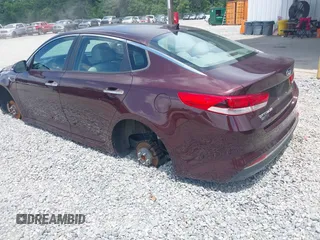 2016 Kia Optima LX with VIN 5XXGT4L3XGG040050, listed as a IAAI auction lot 42363633 with 156,999 mi miles and . Bid and sale history available at DreamBid. Image 3.