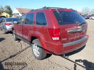 2008 Jeep Grand Cherokee Laredo with VIN 1J8GR48K28C164998, listed as a IAAI auction lot 41844702 with 999,999 mi miles. Bid and sale history available at carsss.com. Image 3.