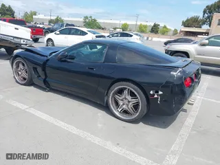 2002 Chevrolet Corvette with VIN 1G1YY22G525105391, listed as a IAAI auction lot 42041878 with 175,128 mi miles. Bid and sale history available at carsss.com. Image 3.