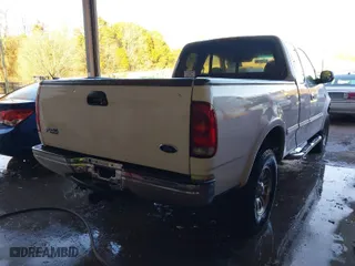 1998 Ford F-150 Standard with VIN 1FTZX18W5WNB68293, listed as a IAAI auction lot 41403989 with 217,473 mi miles. Bid and sale history available at carsss.com. Image 4.