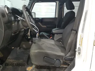 2015 Jeep Wrangler Unlimited Sport with VIN 1C4BJWDG0FL737965, listed as a Copart auction lot 56711765 with 149,528 mi miles and Salvage title. Bid and sale history available at DreamBid. Image 7.