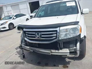 2014 Honda Pilot EX-L with VIN 5FNYF4H52EB055549, listed as a IAAI auction lot 42086456 with 292,594 mi miles and . Bid and sale history available at carsss.com. Image 13.
