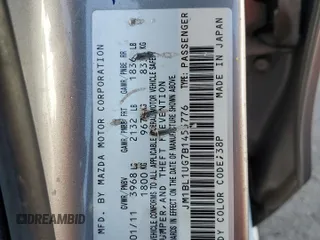 2011 Mazda 3 i Sport with VIN JM1BL1UG7B1455776, listed as a Copart auction lot 54235235 with 133,040 mi miles and Salvage Title. Bid and sale history available at DreamBid. Image 12.