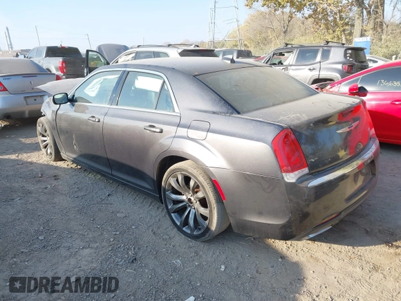 2016 Chrysler 300 Limited with VIN 2C3CCAAG2GH123881, listed as a IAAI auction lot 40713271 with 185,812 mi miles. Bid and sale history available at carsss.com. Image 3.