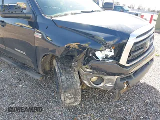 2013 Toyota Tundra 4WD Truck with VIN 5TFDW5F17DX275780, listed as a IAAI auction lot 41710728 with 160,298 mi miles. Bid and sale history available at carsss.com. Image 6.