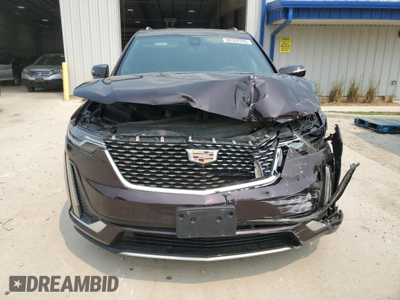 2020 Cadillac XT6 AWD Premium Luxury with VIN 1GYKPDRS4LZ129224, listed as a Copart auction lot 60328745 with 76,290 mi miles and Salvage title. Bid and sale history available at DreamBid. Image 5.