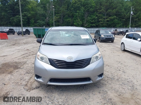2014 Toyota Sienna L z VIN 5TDZK3DC5ES524062, wystawiony jako IAAI lot #42601245 z przebiegiem 130 892 mil mil oraz . Historia ofert i sprzedaży dostępna na DreamBid. Obrazek 12.