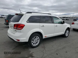 2015 Dodge Journey SXT with VIN 3C4PDCBGXFT743372, listed as a Copart auction lot 65270895 with 119,593 mi miles and Salvage title. Bid and sale history available at DreamBid. Image 3.
