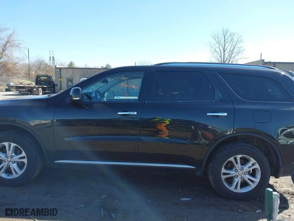2013 Dodge Durango Crew with VIN 1C4RDJDG6DC540482, listed as a IAAI auction lot 41813209 with 140,875 mi miles. Bid and sale history available at carsss.com. Image 14.