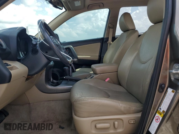 2010 Toyota RAV4 Limited with VIN JTMYK4DVXAD003329, listed as a Copart auction lot 60216955 with 97,372 mi miles and Salvage title. Bid and sale history available at DreamBid. Image 7.