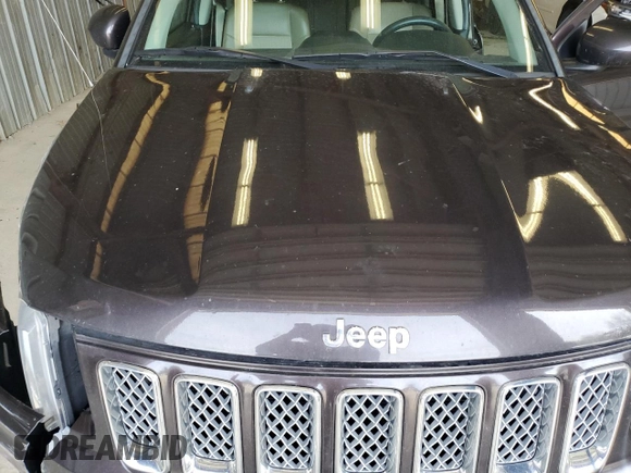 2014 Jeep Compass Latitude with VIN 1C4NJDEB1ED661332, listed as a Copart auction lot 53958985 with 116,020 mi miles and Salvage Title. Bid and sale history available at DreamBid. Image 12.