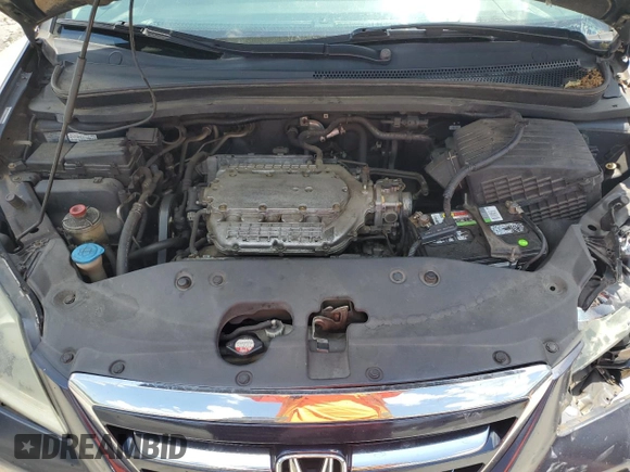2005 Honda Odyssey EX-L z VIN 5FNRL38775B014777, wystawiony jako Copart lot #56245735 z przebiegiem 222 798 mil mil oraz Szkoda całkowita • Salvage title. Historia ofert i sprzedaży dostępna na DreamBid. Obrazek 12.