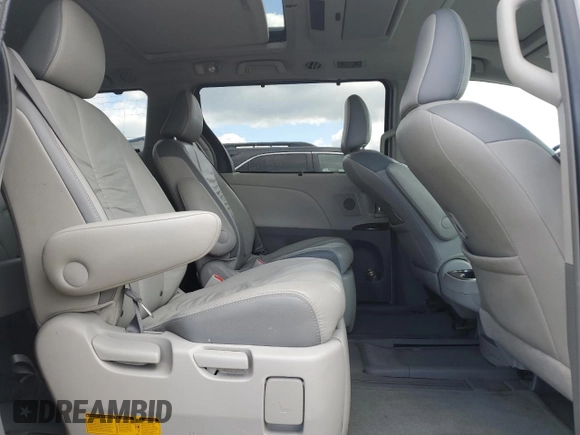 2011 Toyota Sienna XLE z VIN 5TDDK3DC1BS005600, wystawiony jako Copart lot #57795425 z przebiegiem 176 883 mil mil oraz Szkoda całkowita • Salvage title. Historia ofert i sprzedaży dostępna na DreamBid. Obrazek 11.