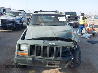 1997 Jeep Cherokee Country with VIN 1J4FT78S1VL522295, listed as a IAAI auction lot 42481630 with 340,239 mi miles and . Bid and sale history available at DreamBid. Image 13.