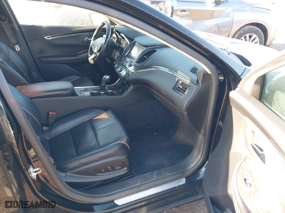 2014 Chevrolet Impala LTZ with VIN 1G1155S30EU105365, listed as a IAAI auction lot 41758977 with 135,119 mi miles. Bid and sale history available at carsss.com. Image 5.