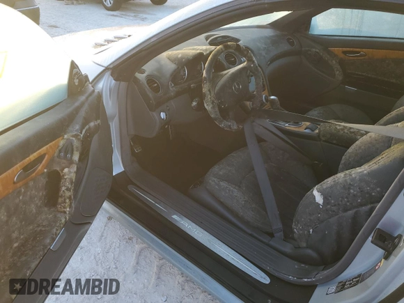 2004 Mercedes-Benz SL 55/63 AMG с VIN WDBSK74F64F071683, выставлен на аукционе Copart как лот 75084534 с пробегом Не указан миль и Списание • Salvage title. История ставок и продаж доступна на DreamBid. Изображение 9.