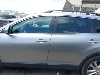 2011 Mazda CX-9 Grand Touring z VIN JM3TB2DA5B0319538, wystawiony jako IAAI lot #42429157 z przebiegiem 88 321 mil mil oraz . Historia ofert i sprzedaży dostępna na DreamBid. Obrazek 15.