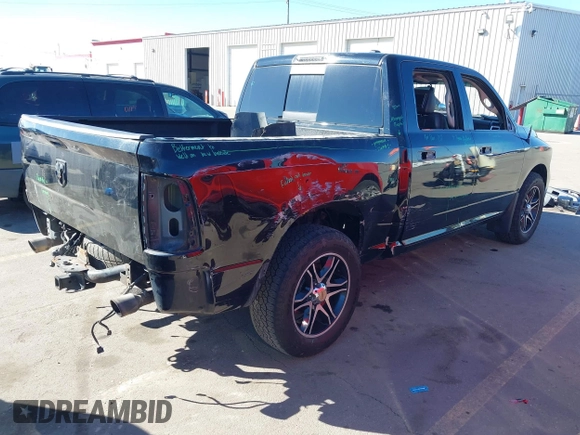 2012 Ram 1500 Sport with VIN 1C6RD7MT2CS277242, listed as a IAAI auction lot 41686364 with 202,023 mi miles. Bid and sale history available at carsss.com. Image 4.