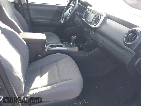 2018 Toyota Tacoma SR5 with VIN 3TMAZ5CN4JM069965, listed as a IAAI auction lot 41798238 with 124,619 mi miles and . Bid and sale history available at DreamBid. Image 5.