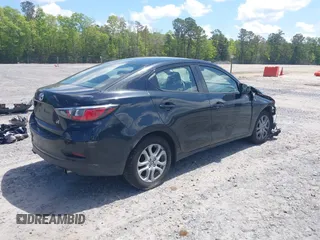 2018 Toyota Yaris with VIN 3MYDLBYV4JY311444, listed as a IAAI auction lot 42010011 with 43,080 mi miles and . Bid and sale history available at DreamBid. Image 4.
