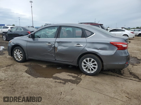 2018 Nissan Sentra S z VIN 3N1AB7AP4JY253237, wystawiony jako Copart lot #57484815 z przebiegiem 188 037 mil mil oraz Czysty tytuł • Clean title. Historia ofert i sprzedaży dostępna na DreamBid. Obrazek 2.