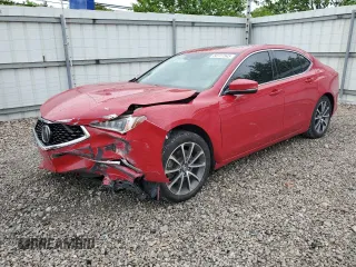 2018 Acura TLX z VIN 19UUB2F34JA003764, wystawiony jako Copart lot #56737545 z przebiegiem 143 011 mil mil oraz Czysty tytuł • Clean title. Historia ofert i sprzedaży dostępna na DreamBid. Obrazek 1.