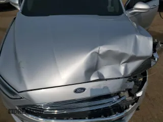 2017 Ford Fusion SE z VIN 3FA6P0HD0HR139771, wystawiony jako Copart lot #59438385 z przebiegiem 103 214 mil mil oraz Czysty tytuł • Clean title. Historia ofert i sprzedaży dostępna na DreamBid. Obrazek 11.