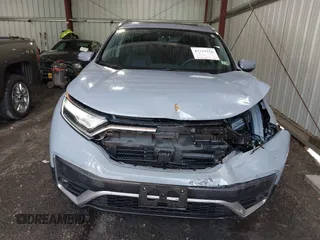 2020 Honda CR-V Touring z VIN 2HKRW2H90LH608435, wystawiony jako IAAI lot #42318256 z przebiegiem 32 602 mil mil oraz . Historia ofert i sprzedaży dostępna na DreamBid. Obrazek 6.