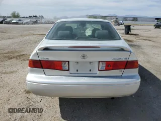 2000 Toyota Camry LE z VIN JT2BF28K0Y0261092, wystawiony jako Copart lot #58008665 z przebiegiem Nie podano mil oraz Szkoda całkowita • Salvage title. Historia ofert i sprzedaży dostępna na DreamBid. Obrazek 6.
