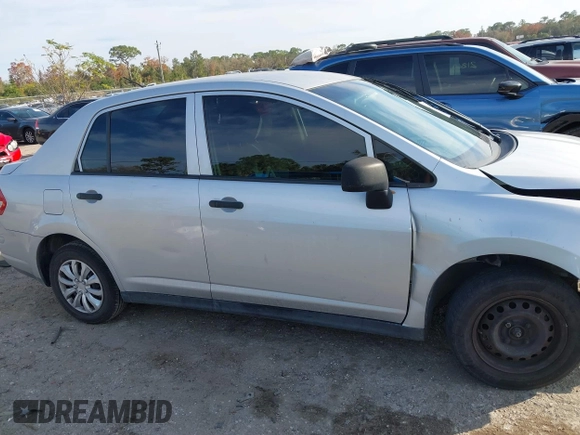 2010 Nissan Versa 1.6 with VIN 3N1CC1AP5AL422567, listed as a IAAI auction lot 41463273 with 167,038 mi miles. Bid and sale history available at carsss.com. Image 14.