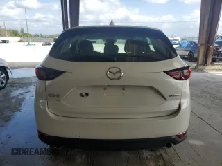 2021 Mazda CX-5 Sport with VIN JM3KFABM4M0388344, listed as a Copart auction lot 50724805 with 24,554 mi miles and Salvage Title. Bid and sale history available at carsss.com. Image 6.