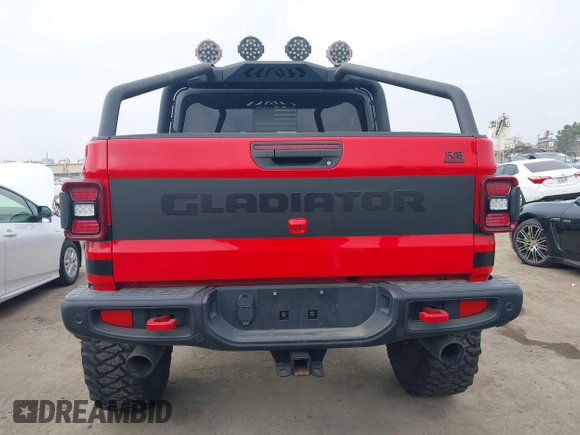 2020 Jeep Gladiator Rubicon with VIN 1C6JJTBG4LL178260, listed as a IAAI auction lot 42602460 with 61,899 mi miles and . Bid and sale history available at DreamBid. Image 16.
