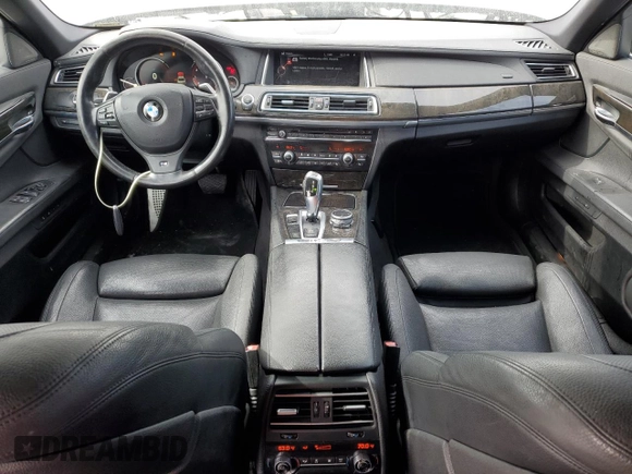 2015 BMW 7 Series 740i with VIN WBAYA6C50FD826727, listed as a Copart auction lot 82197433 with 241,799 mi miles and . Bid and sale history available at DreamBid. Image 8.