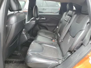 2016 Jeep Cherokee Trailhawk z VIN 1C4PJMBS6GW134052, wystawiony jako Copart lot #55398625 z przebiegiem 158 742 mil mil oraz Nie do naprawy • Non repairable. Historia ofert i sprzedaży dostępna na DreamBid. Obrazek 10.