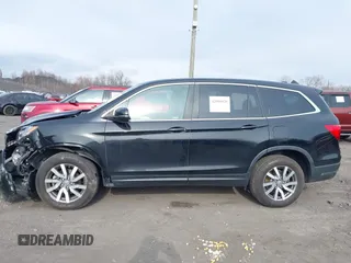 2021 Honda Pilot EX-L with VIN 5FNYF6H56MB099919, listed as a IAAI auction lot 42000420 with 28,877 mi miles and . Bid and sale history available at carsss.com. Image 14.