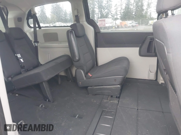 2009 Dodge Grand Caravan SXT z VIN 2D8HN54119R569142, wystawiony jako IAAI lot #42000421 z przebiegiem 161 717 mil mil oraz . Historia ofert i sprzedaży dostępna na DreamBid. Obrazek 8.