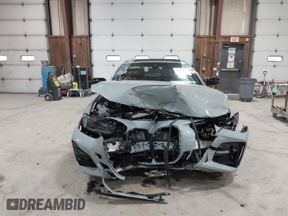 2023 BMW 4 Series 430i xDrive with VIN WBA43AT02PCM45372, listed as a IAAI auction lot 41736410 with 16,695 mi miles and . Bid and sale history available at DreamBid. Image 6.