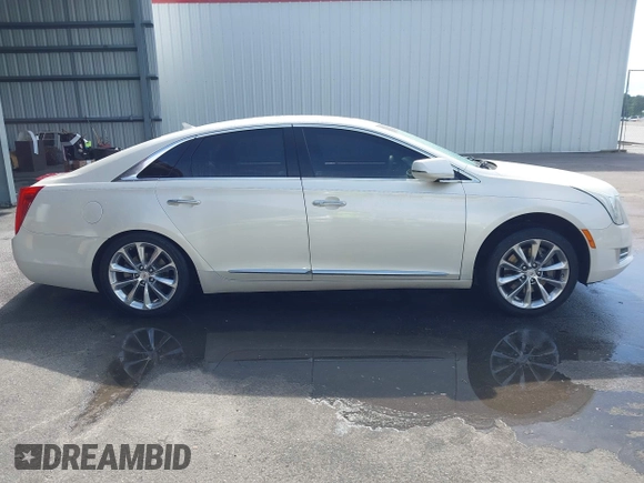 2013 Cadillac XTS Premium z VIN 2G61S5S35D9103948, wystawiony jako IAAI lot #42090444 z przebiegiem 154 728 mil mil oraz . Historia ofert i sprzedaży dostępna na DreamBid. Obrazek 13.