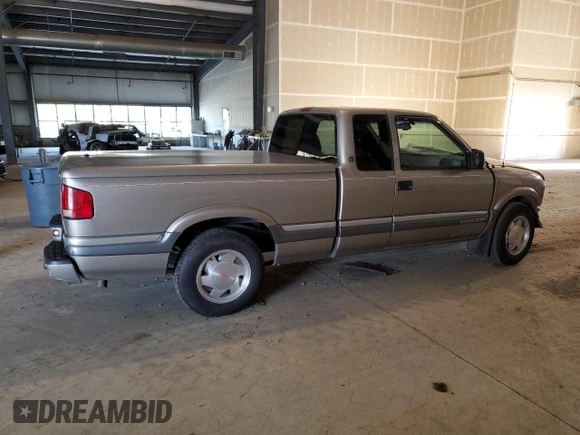 2000 GMC Sonoma SLS z VIN 1GTCS19W0Y8146125, wystawiony jako Copart lot #71576724 z przebiegiem 73 854 mil mil oraz Szkody całkowita. Historia ofert i sprzedaży dostępna na DreamBid. Obrazek 3.