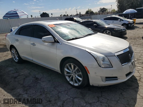 2014 Cadillac XTS Premium with VIN 2G61P5S36E9305491, listed as a Copart auction lot 44404425 with 104,710 mi miles and Salvage Title. Bid and sale history available at DreamBid. Image 4.