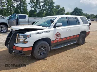 2018 Chevrolet Tahoe Commercial with VIN 1GNLCDEC4JR260694, listed as a Copart auction lot 61680385 with 156,328 mi miles and Salvage title. Bid and sale history available at DreamBid. Image 1.