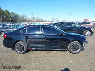 2014 Volkswagen Jetta Sedan SE w/Connectivity with VIN 3VWB07AJ4EM332601, listed as a IAAI auction lot 41430088 with 133,623 mi miles. Bid and sale history available at carsss.com. Image 14.